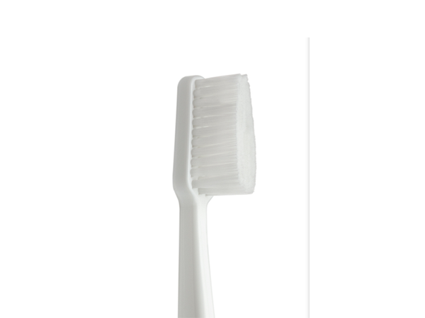 Load image into Gallery viewer, White Gentle Care Toothbrush up close.
