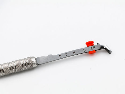 adjustable button of the Bioclear Adjustable Push Pull instrument