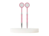 Pink MirroSoft double-sided dental mirror shown from front and side profiles.